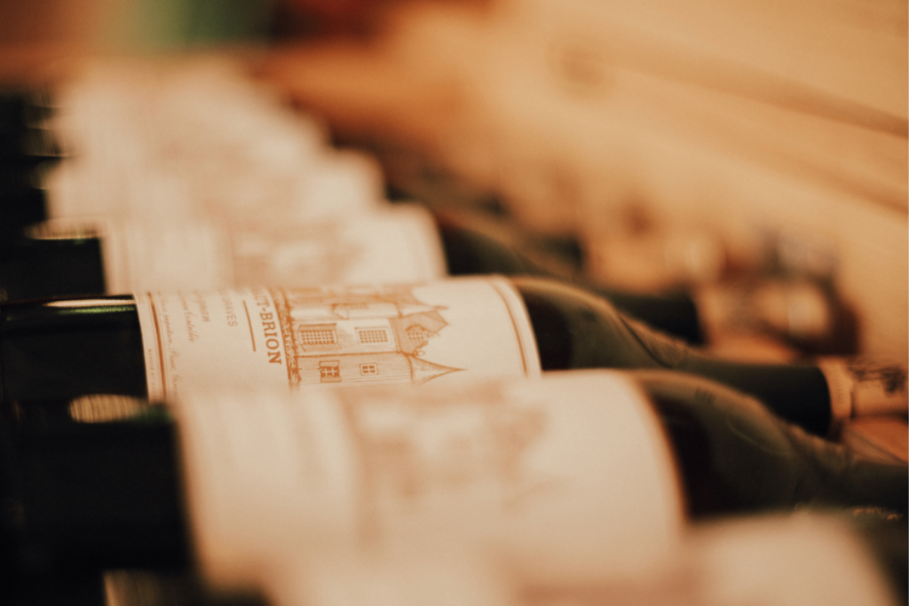 A row of Haut Brion bottles lying down